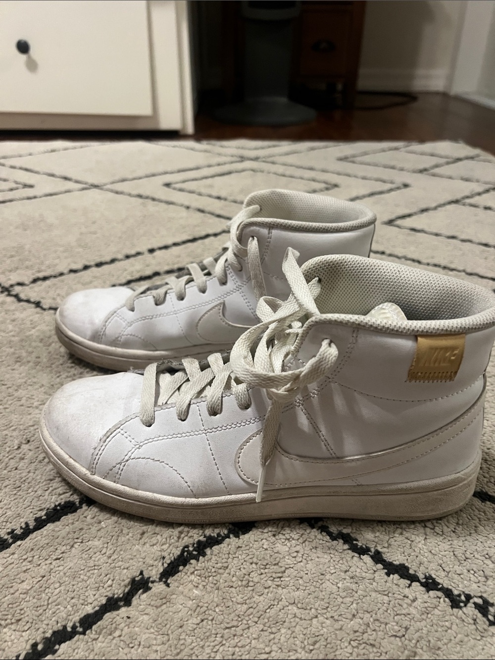 Nike White High-Top Sneakers with Gold Heel Tab